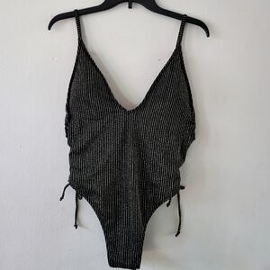 South Beach One Piece Swimsuit. Size 10, New, ruched detail with tie closure